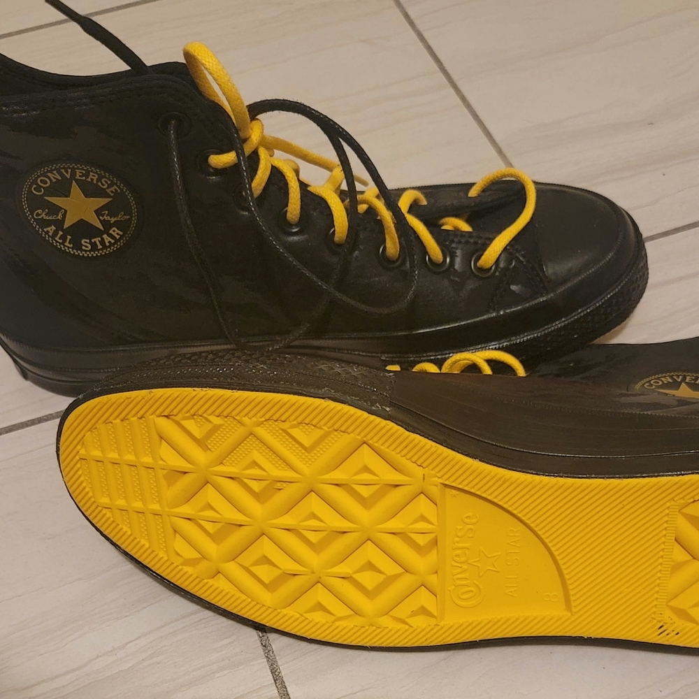 New, Converse Chuck Taylor size 8 for Men. Black with yellow bottoms and yellow